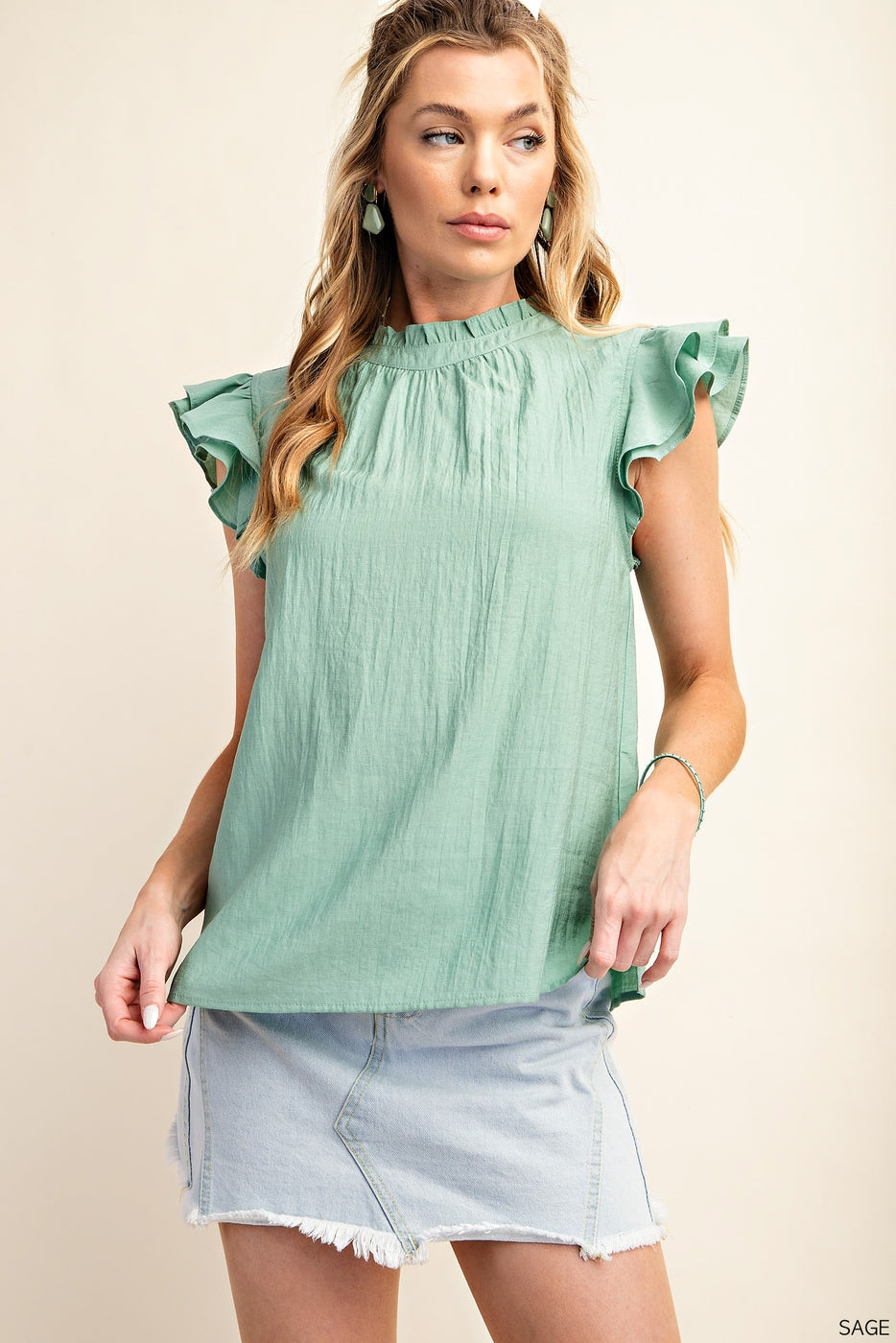 *STYLISH TEXTURED RAYON TOP WITH RUFFLE NECK AND BACK BUTTON CLOSER