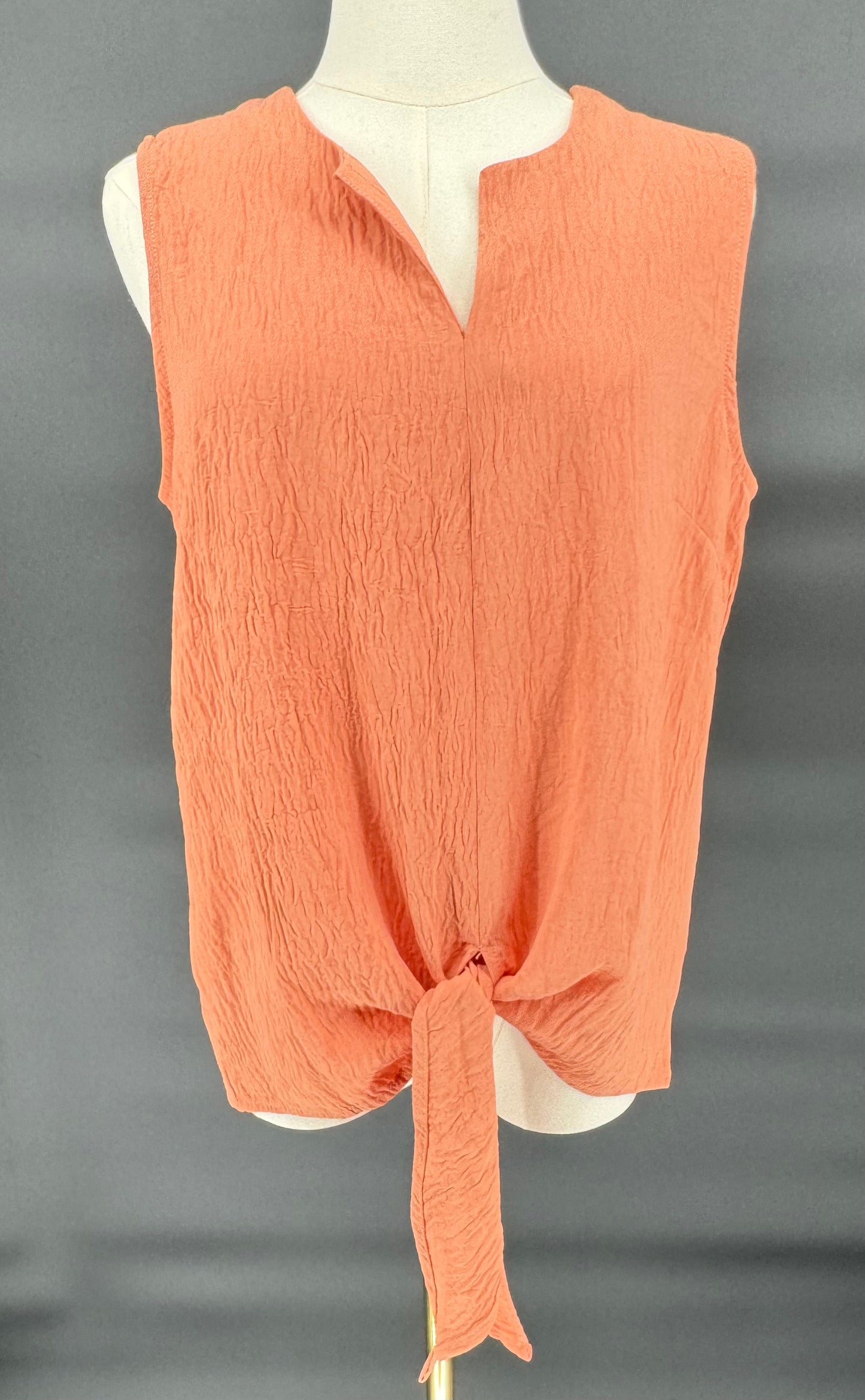 *PEACH WOVEN SLEEVELESS TOP WITH V-NECK AND OPEN BOTTOM TIE DETIAL