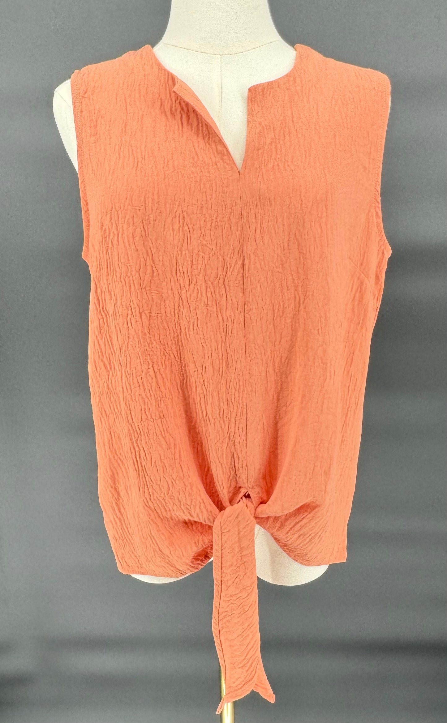 *PEACH WOVEN SLEEVELESS TOP WITH V-NECK AND OPEN BOTTOM TIE DETIAL