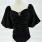 SHORT PUFF SLEEVE BODYSUIT WITH SMOCKING DETAIL - BLACK