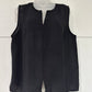 BLACK WOVEN SLEEVELESS TOP WITH V-NECK AND OPEN BOTTOM TIE DETIAL