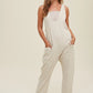 ECRU KNIT OPEN BACK JUMPSUIT WITH POCKETS