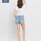 PLUS SIZE MID RISE RAW DISTRESSED HEM SHORTS