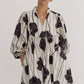 *Black and White Printed v-neck 3/4 sleeve mini dress