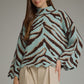 Animal print long sleeve knit top
